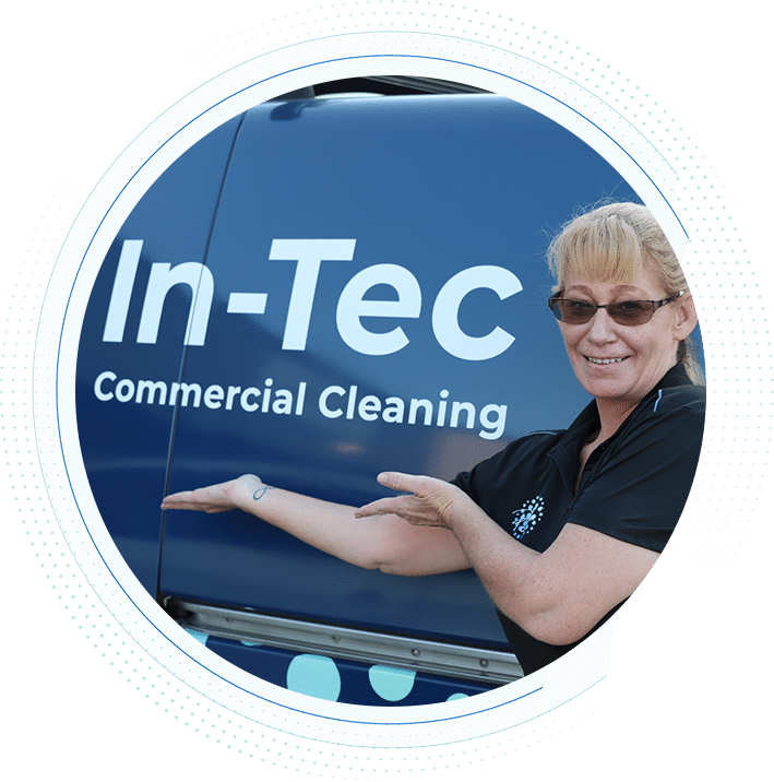 happy-cleaner-next-to-in-tec-van